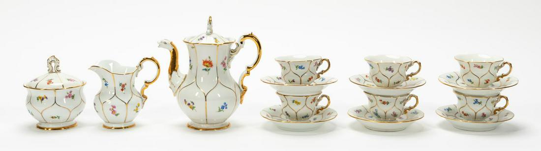 15PC MEISSEN FLORAL DEMITASSE PORCELAIN SET: Meissen (German), mostly second half 20th century. Fifteen piece demitasse set in a scattered floral pattern with gold segments. Service comprising of one demitasse pot (h. 7", w. 6.375), one sugar, o