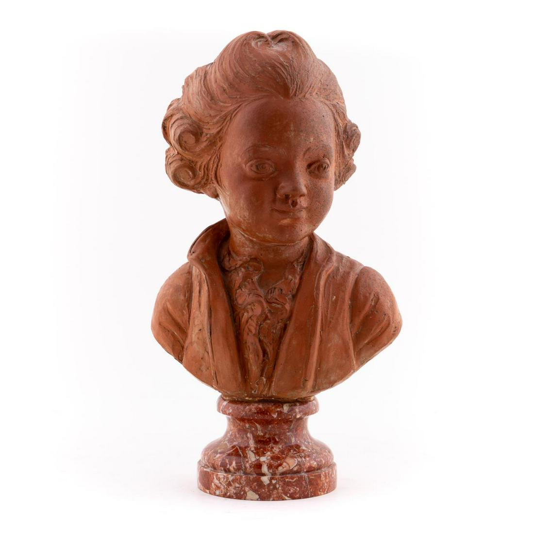 TERRACOTTA BUST OF A BOY, YOUNG COMPOSER: Continental School, 20th century. After an earlier bust, possibly of a young composer. Terracotta with marble socle, inscribed "C. Gir, Paris, 1775".Approx. h 13.5"