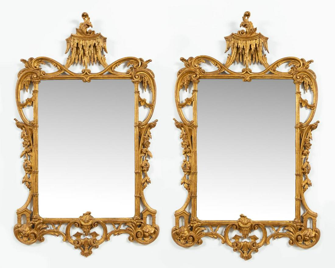 PR, CHINESE CHIPPENDALE STYLE MIRRORS, 19TH/20TH C: Italian, late 19th to early 20th century. A pair of carved giltwood Chinese Chippendale style looking glass mirrors. Apparently unmarked. Approx: h. 58", w. 35".