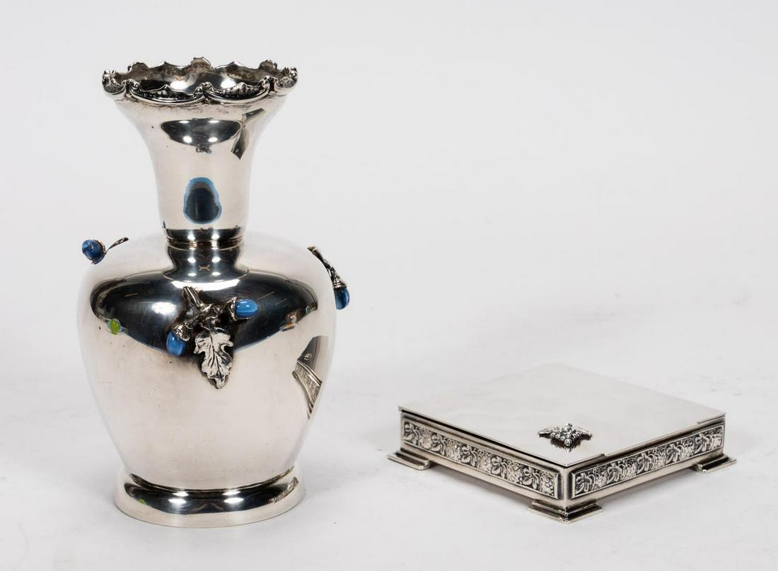 TWO 20TH C. ITALIAN STERLING SILVER ITEMS: G. Del Bono (Italian, 20th century). Two sterling silver naturalistic motif table accessories including a vase with applied glass acorn leaf decorations (7") and a grape motif vanity box (4"). The vas