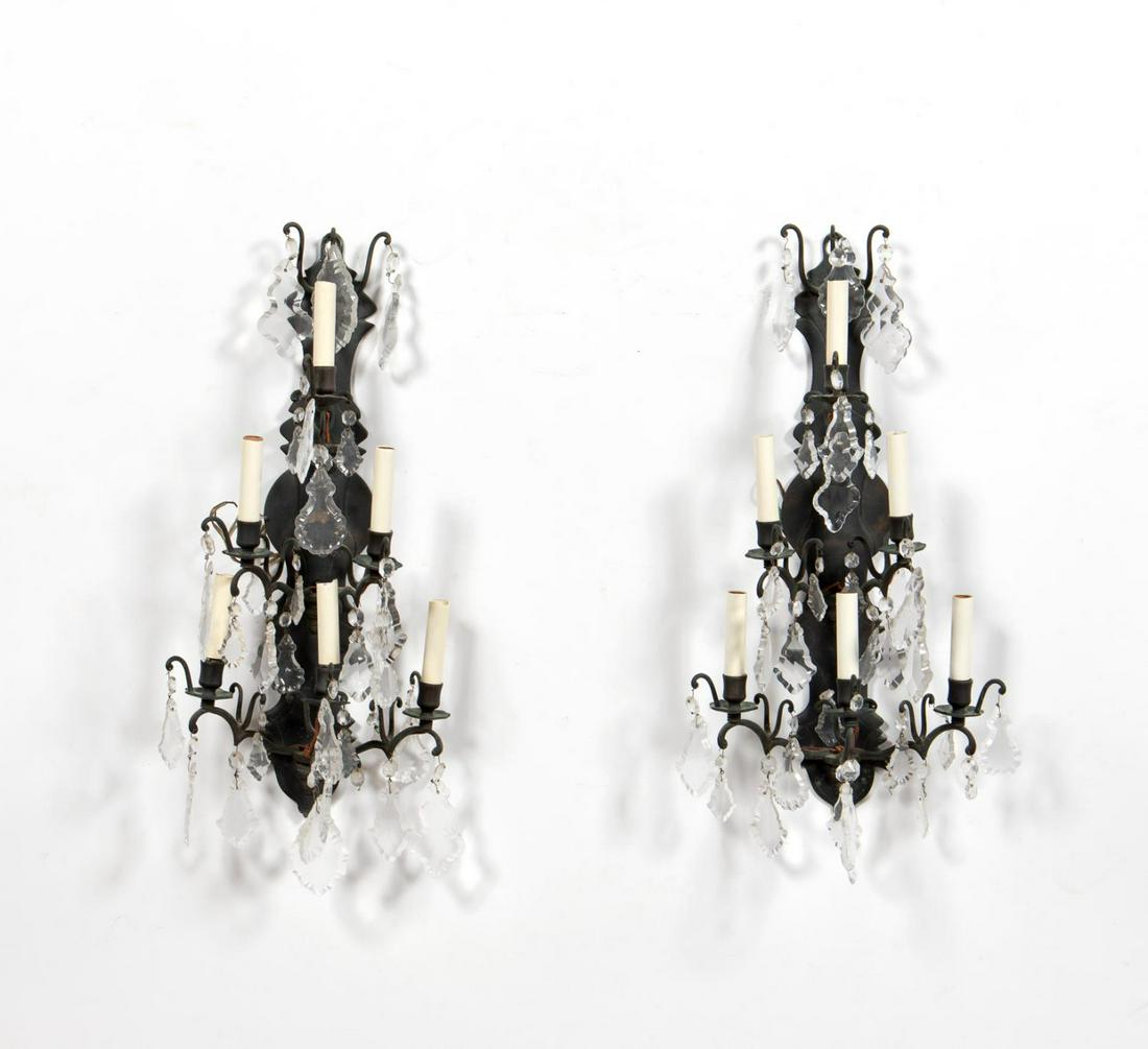 PAIR OF BRONZE & CRYSTAL 6-LIGHT WALL SCONCES: Probably Italian, 20th century. Pair of dark patina bronze frame six light wall sconces with applied cut crystal prisms.Approx. h. 27", w. 14.5", d. 7.5"