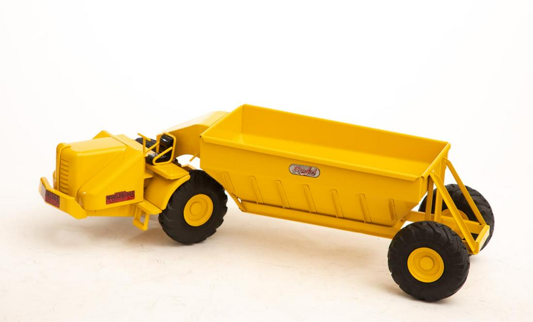 Yellow Model Earth Mover by Doepke: Diecast model toy truck. 25"L Please note: This lot is not housed at Ahlers & Ogletree Auction Gallery. Pickup address will be supplied to winning bidder. All purchased lots MUST be picked up January