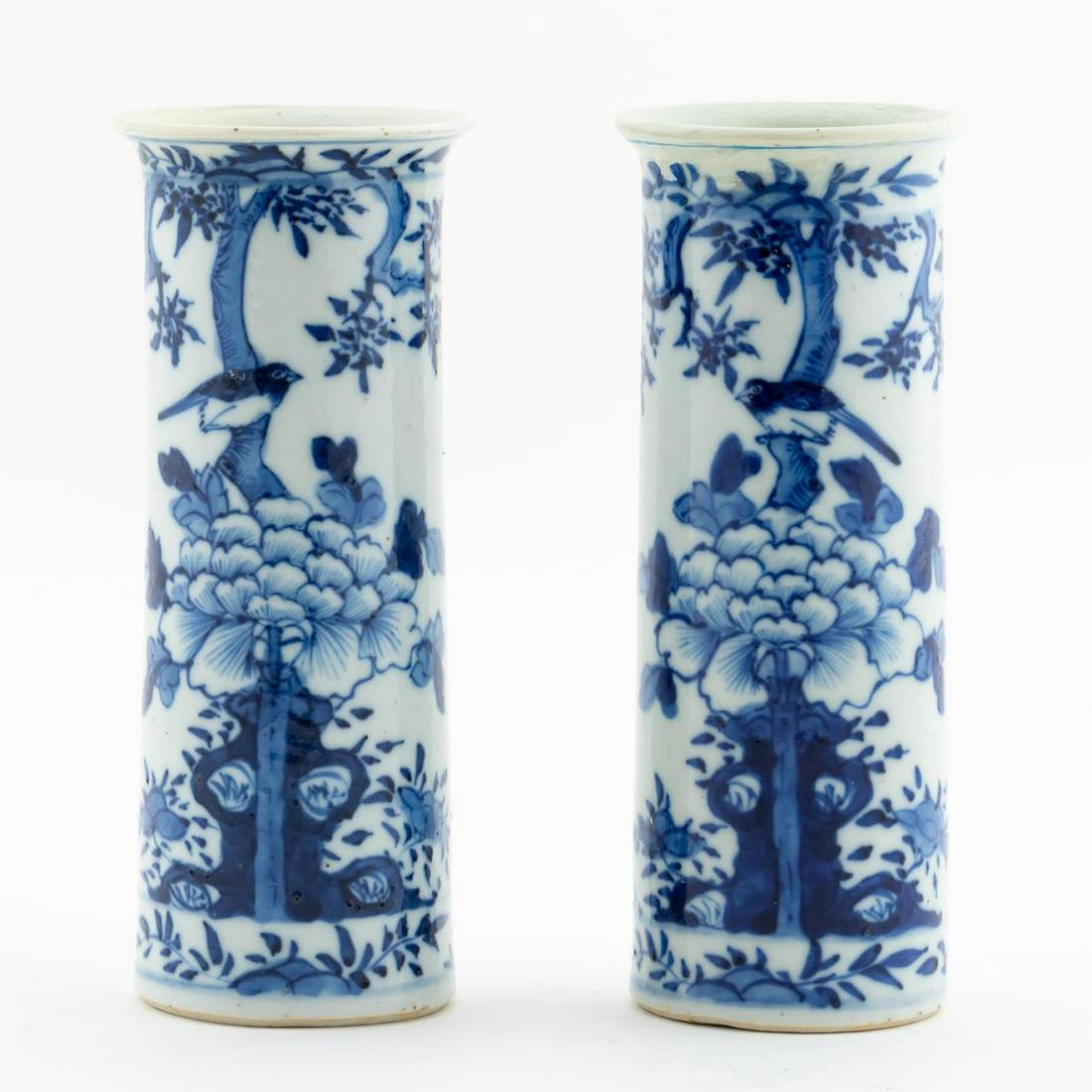 PAIR, CHINESE DIMINUTIVE BLUE & WHITE BEAKER VASES: Chinese. Pair of diminutive blue and white porcelain beaker form vases having decoration depicting opposing birds in a floral landscape. Double blue circle mark to the underside of each. Approx. of on