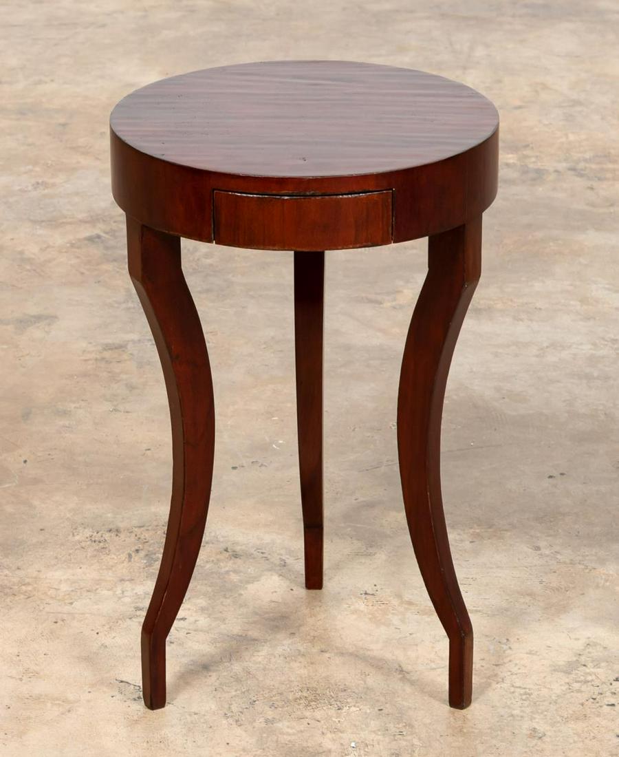 DAVID IATESTA SMALL "CAVALLO" WALNUT SIDE TABLE: David Iatesta (American), 20th century. "Cavallo" walnut veneer small side table with rounded top and curved legs. Maker's mark to back of drawer. Approx. h. 21.75", dia. 13.5".