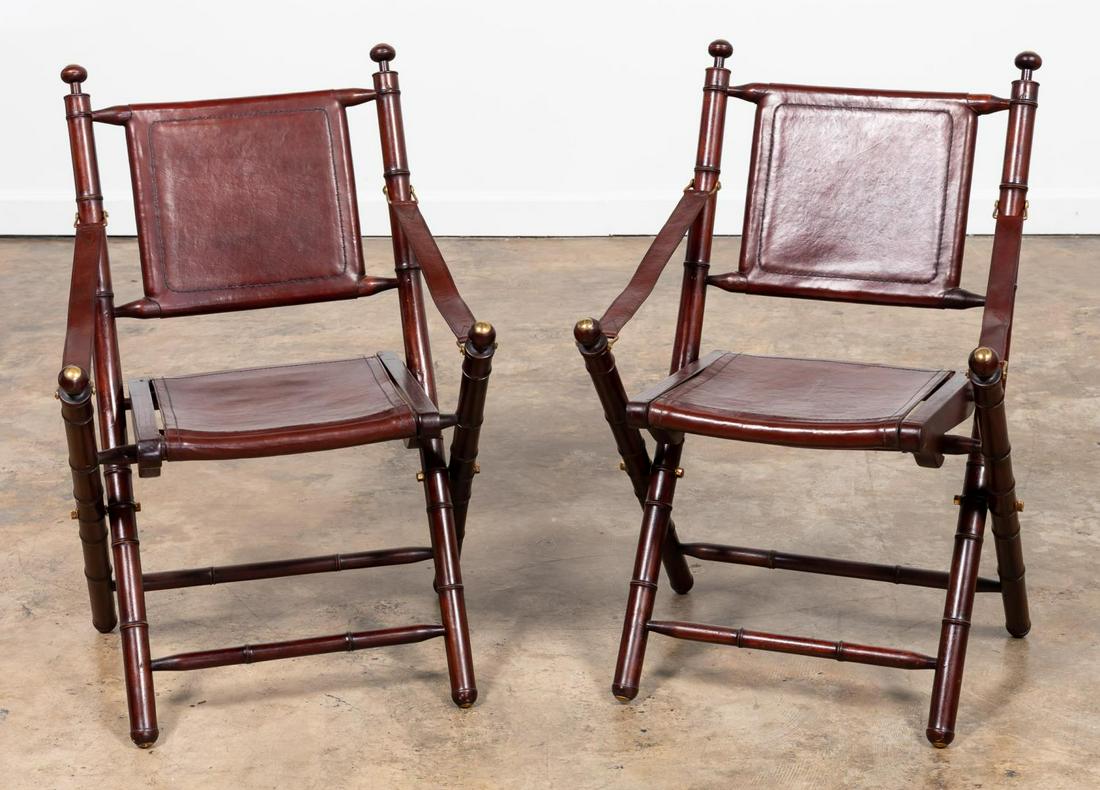 PAIR, PALECEK FOLDING LEATHER CAMPAIGN CHAIRS: Palecek (American, founded 1974). Pair of folding campaign style folding chairs having turned supports and brown leather seats. Unmarked. Approx. of one, h. 35", w. 23.25", d. 16.25"