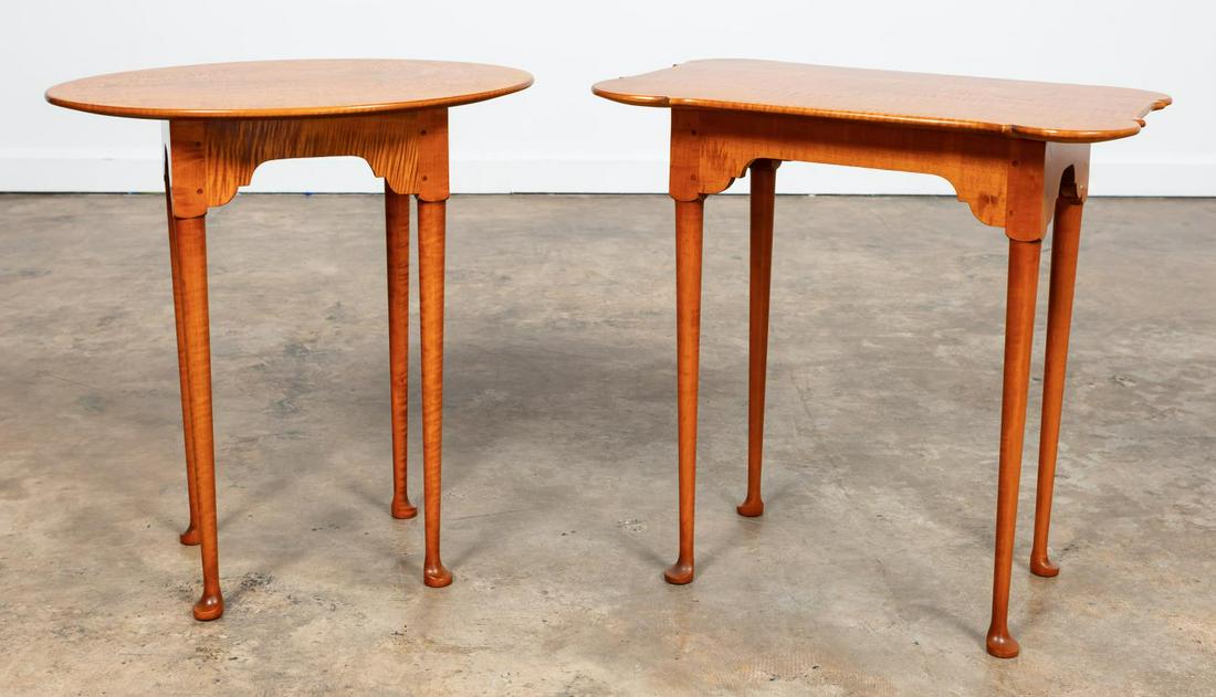 TWO ELDRED WHEELER TIGER MAPLE OCCASIONAL TABLES: Eldred Wheeler (American), 20th century. Two Queen Anne style tiger maple side tables, one rectangular form with scalloped corners and one oval form. Both are marked to underside. Approx. h. 25.125",