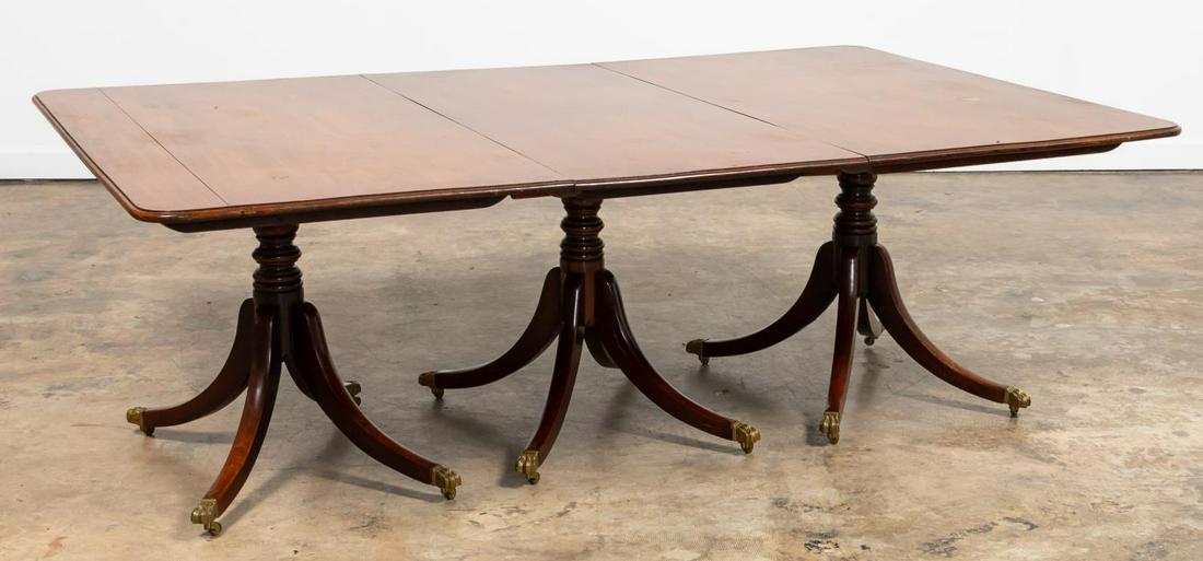 FEDERAL STYLE THREE PEDESTAL MAHOGANY DINING TABLE: American or English. Federal style mahogany three pedestal dining table. Including two leaves. Apparently unmarked. Approx. h. 28", w. 84" (with out leaves), d. 54.25"; small leaf 7".