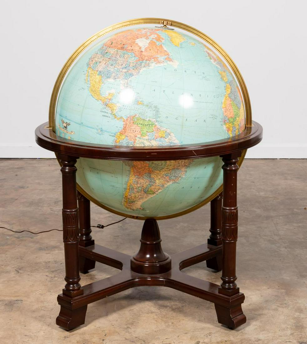 REPLOGLE 32" LIGHTED STANDING LIBRARY GLOBE: Replogle (American, founded 1930 ). Large vintage standing lighted library globe having a four-part mahogany and brass base with carved detail. Marked to globe, model number 65307 and serial number 22