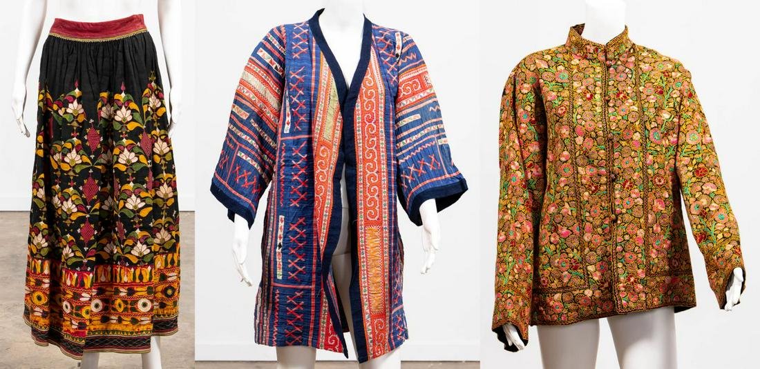 THREE HIGHLY EMBROIDERED ETHNOGRAPHIC GARMENTS: Group of three vintage embroidered garments, likely Southeast Asian and Middle Eastern, comprising two jackets and one skirt. Apparently unmarked. Approx. flat measurements floral jacket shoulder 19",