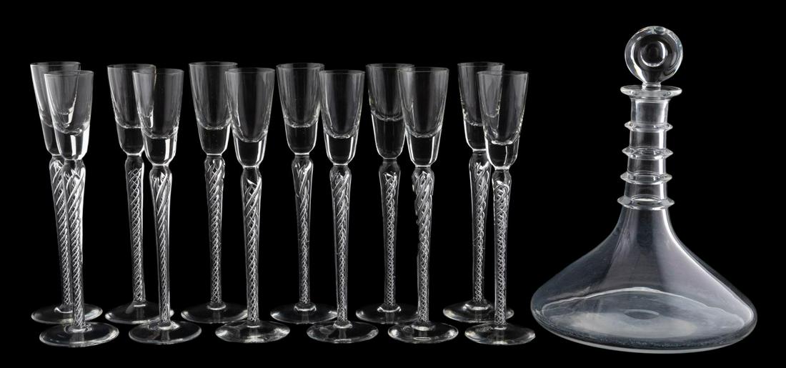 13 PCS, CRYSTAL BARWARE, STEUBEN, TWIST CORDIAL: Collection of glass and crystal barware comprising signed Steuben crystal decanter with stopper and twelve cordial glasses with air twist stems, apparently unmarked. Approx. h. 10" (decanter), h. 8.5"
