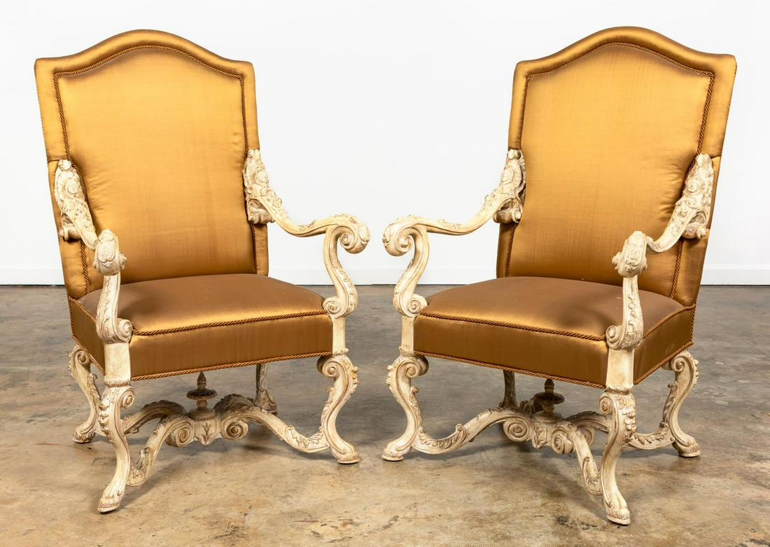 PR, PHYLLIS MORRIS ORNATE BAROQUE STYLE ARMCHAIRS: Phyllis Morris (American, founded 1953), contemporary. Pair of carved wood Italian Baroque style faux distressed painted armchairs with silk upholstery. Apparently unmarked. Approx. h. 49", w. 29.5",