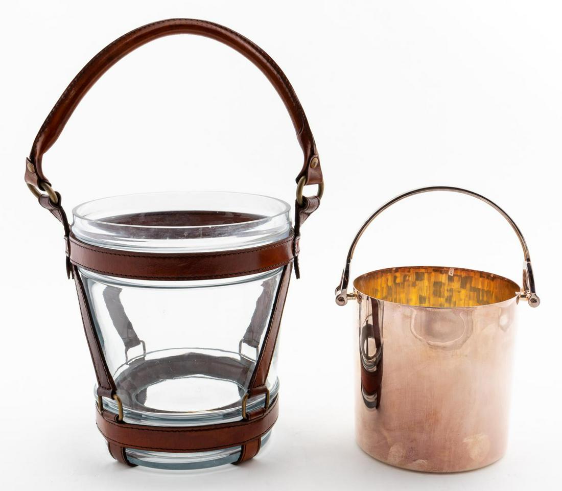 2 PCS, EQUESTRIAN MOTIF ICE BUCKETS, RALPH LAUREN: Ralph Lauren "Wentworth" pattern marked silverplate ice bucket together with an unmarked Ralph Lauren style glass and leather ice bucket or champagne chiller. Approx. tallest 9" (top of bucket)