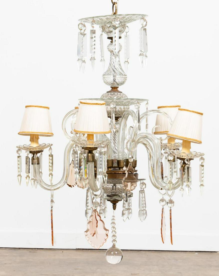 MID-20TH C. FIVE-LIGHT CRYSTAL CHANDELIER: Likely Czechoslovakian, mid-20th century. Moulded and cut colorless five-light leaded crystal chandelier hung with colorless and peach/pink faceted pendants, and twisted arms. Unmarked. Approx. h. 33"