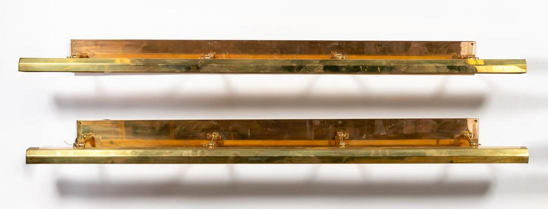 PAIR CHAPMAN STYLE BRASS LIBRARY OR PICTURE LIGHTS: Chapman style contemporary pair of picture or wall mounted library lights, each having 8-lights, adjustable shade, and rectangular backplate. Approx. h. 5", w. 70", d. 9.75"