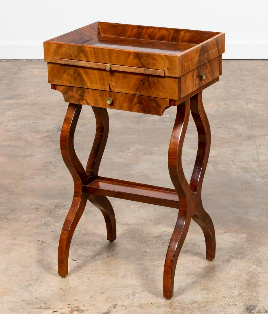 19TH C. CONTINENTAL WALNUT WORK TABLE: Continental, 19th century. Walnut work or sewing table table having a tray top, multiple drawers, and rising on stylized lyre form trestle legs. Unmarked. Approx. 30.75", w. 13", d. 18.25"