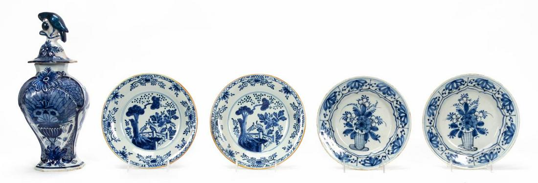 5 PC, DELFTWARE INCLUDING JOHANNES VAN DUYN: Dutch, 18th to 19th century. Five piece group of Delftware including a vase with parrot form to lid, a pair of 9.25" plates with landscape decoration to bowl and a pair of floral decorated 9" plates.