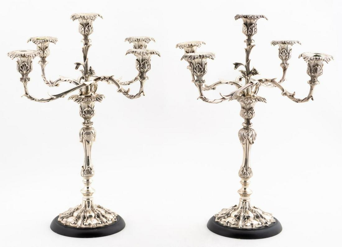 PAIR OF ROCOCO STYLE SILVERPLATE 5 ARM CANDELABRA: Italian style, 20th century. Pair of Rococo style silverplate five light candelabra with acanthus leaf details and upturned scroll arms. Apparently unmarked. Approx. h. 20.75", w. 16.875".