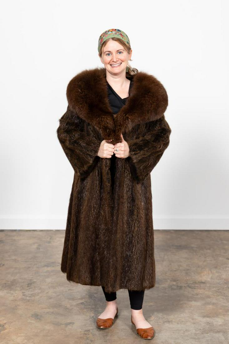 VINTAGE HENRI BENDEL LADIES BROWN MINK COAT: Henri Bendel (American, 1895-2019). Vintage ladies brown mink fur coat having a shawl collar. Label to lining. Approx. flat measurements: shoulder 20", sleeve 19", bust 20", total length 43".