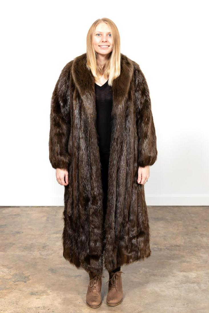 FULL LENGTH LADIES FUR COAT, LIKELY MINK: Full length ladies brown fur coat, likely mink, and having a shawl collar. "Made in Greece" and "Macy's Fur Salon" labels to the lining. Approx. flat measurements: shoulder 22", sleeve 25", bust 21",