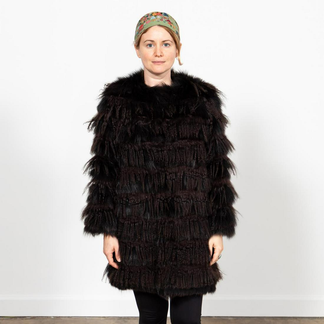 LADIES LAMB & SILVER FOX FUR FASHION JACKET: Ladies dyed black lamb and silver fox jacket. Labels to the lining. Size small, approx. flat measurements: shoulder 18", sleeve 15", bust 17", total length 32".