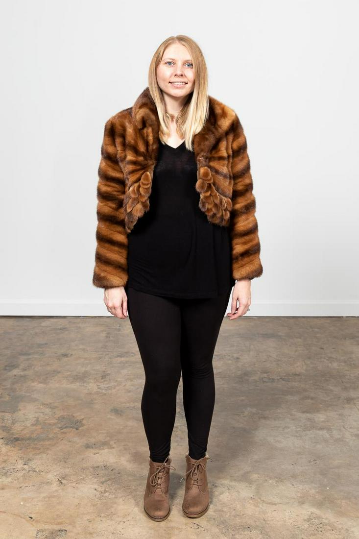 HENIG FURS CROPPED CHESTNUT MINK FASHION COAT: Henig Furs (American, founded 1920). Cropped ladies chestnut brown mink fashion coat having a pierced draped edge. Henig Furs label to the lining marked Michelle Furs. Approx. flat measurements: shoul