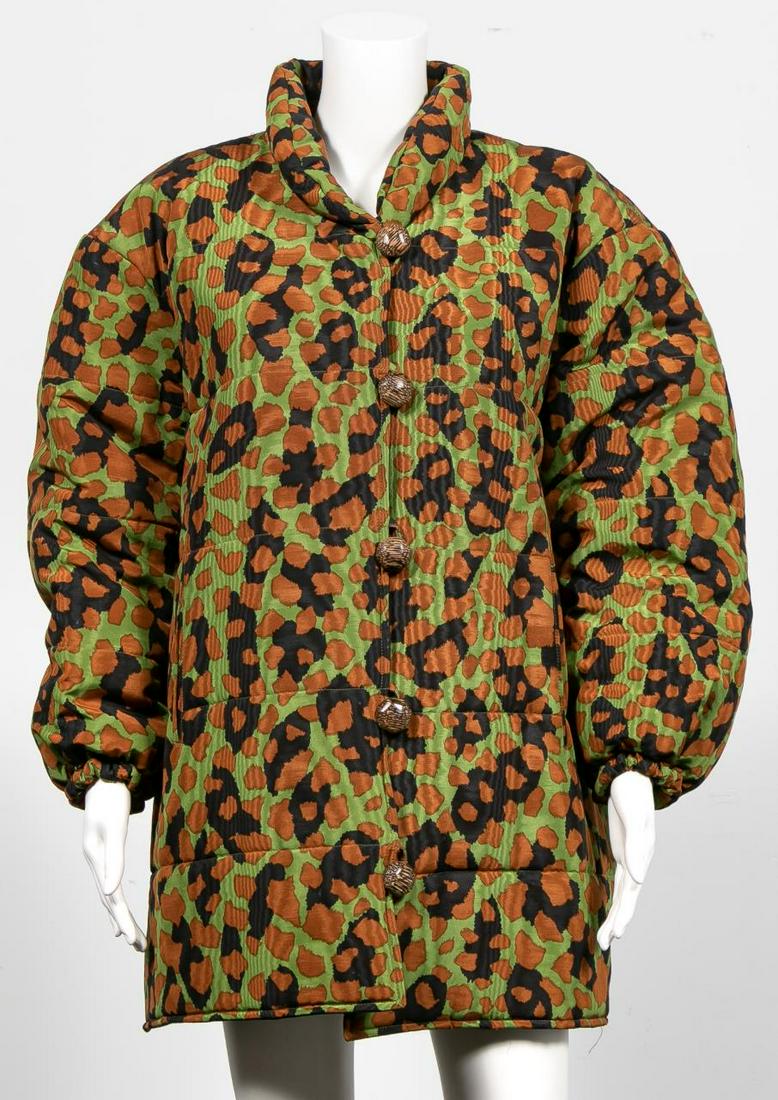 VINTAGE YVES ST. LAURENT CAMO PUFFER JACKET: Yves Saint Laurent (French, founded 1961), circa 1980. A vintage puffer jacket having an animal print over a camouflage. Label marked Saint Laurent / Rive Gauche / Made in France / Paris, Size 38. App