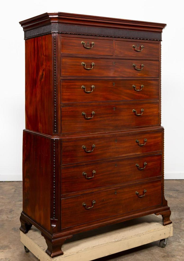 19TH C.GEORGIAN STYLE MAHOGANY CHEST ON CHEST: English, 19th century. Two part mahogany chest on chest in the Georgian Chippendale taste, having a shaped cornice, fluted frieze, chamfered corners, two small drawers, with six conforming drawers bel