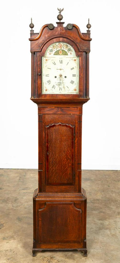 E. 19TH C. MAHOGANY GEORGE III LONGCASE CLOCK: English, early 19th century. George III oak and mahogany long case clock with Joseph Churton, Whitchurch, hand painted face and works. Marked to lower front face. Approx. h. 88, w. 20.25", d. 9.5"