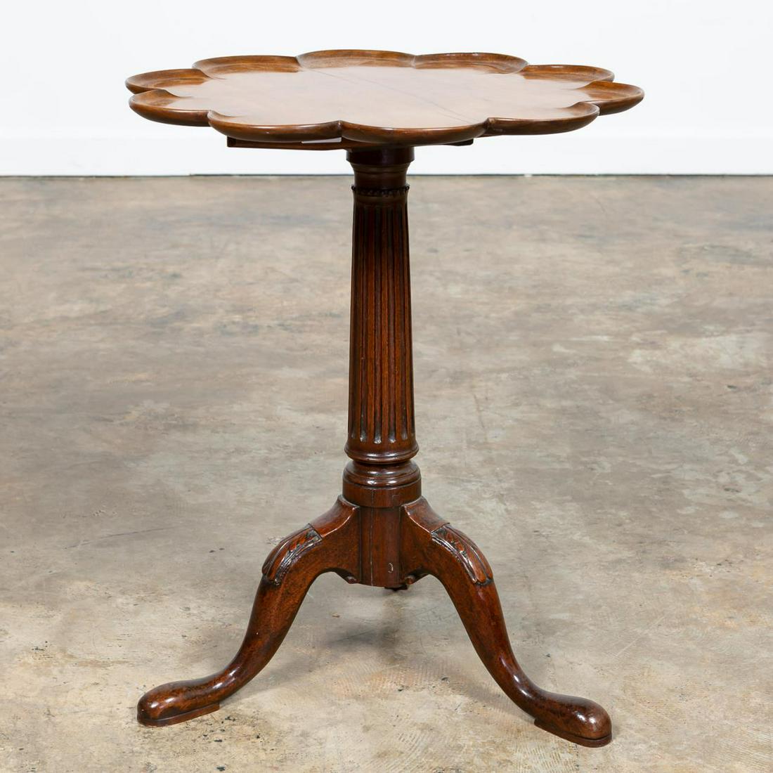 19TH C. QUEEN ANNE STYLE SCALLOPED TILT TOP TABLE: English, 19th century. Queen Anne style tilt top tea table having scalloped edge, fluted column support, and slipper feet. Apparently unmarked. Note: Two address labels to underside one with Montecito