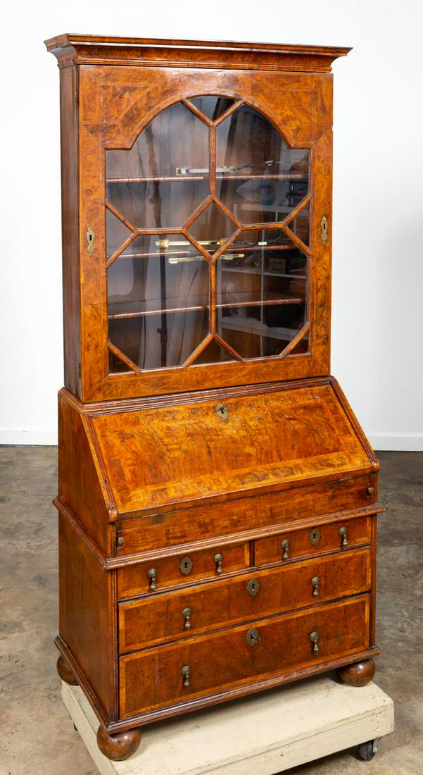 18TH C. ENGLISH QUEEN ANNE BURL BUREAU BOOKCASE: English, 18th century with later top. Burl walnut Queen Anne secretary bureau desk, in two parts, having a fall front writing surface, the interior fitted with multiple compartments and drawers, the c