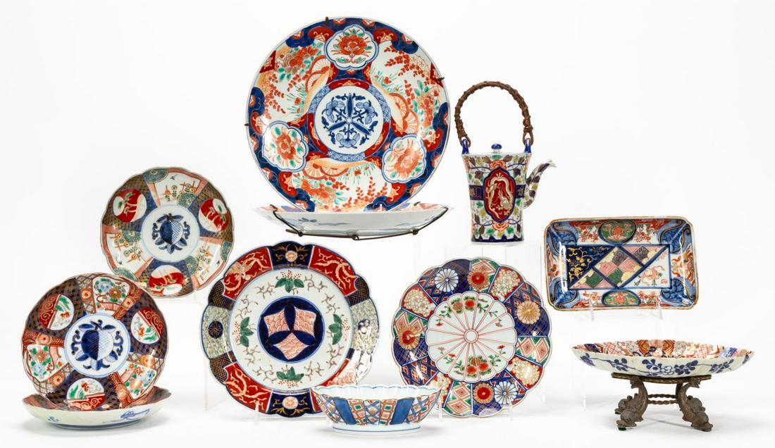 11 PCS, ASIAN IMARI DECORATIVE SERVING PIECES: Japanese and Chinese. Collection of eleven Imari pattern porcelain decorative objects comprising pair plates with impressed marks (11.75"), pair plates one with blue character mark (7.75"), plate with