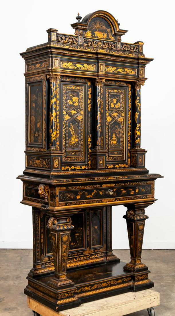LATE 19TH C. LARGE BLACK & GILT JAPANNED CABINET: Continental, late 19th century. Baroque style japanned gilt and black lacquer cabinet on stand having chinoiserie motif, column accents and carved decorative frieze. Apparently unmarked. Approx. h. 89