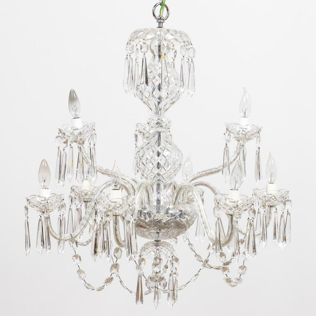 WATERFORD CRYSTAL 'CRANMORE' NINE-LIGHT CHANDELIER: Waterford Crystal (Irish, founded 1783), third quarter 20th century. Colorless leaded cut glass chandelier having a bulbous body, the canopy and bobeches hung with pendants, the lower bowl issuing nin