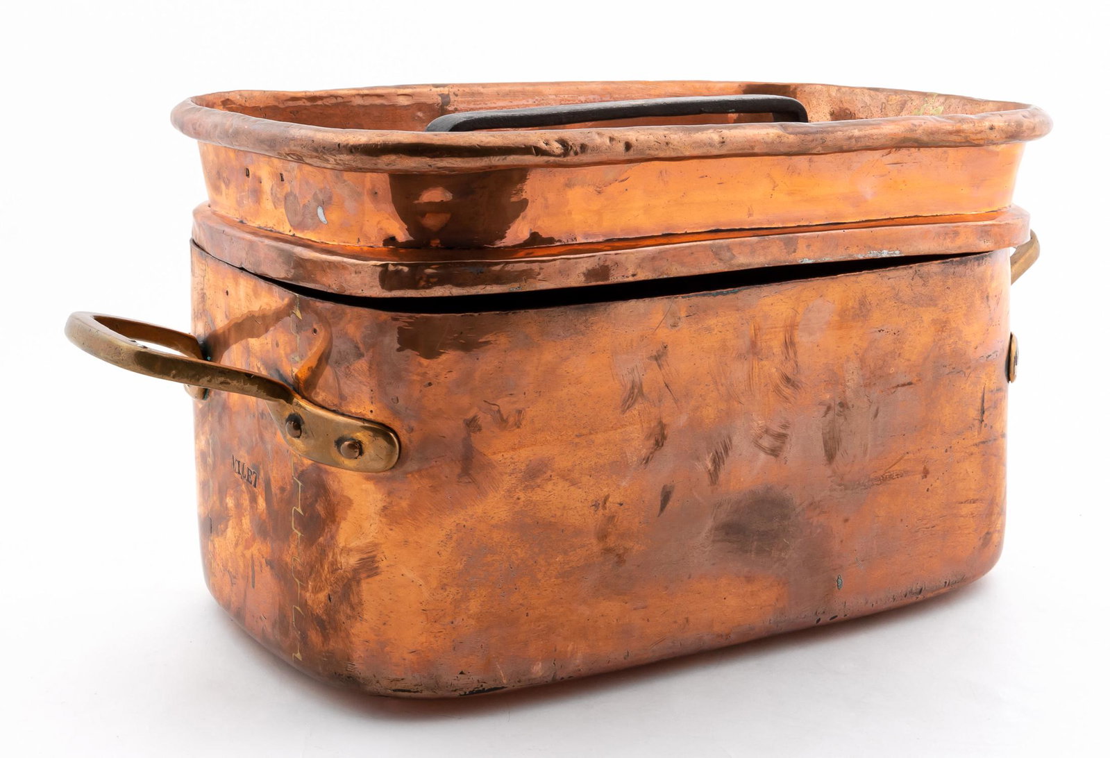 19TH C. FRENCH COPPER BOILER: French, 19th century. Oblong form lidded copper boiler pot having iron and brass handles, and dovetailed construction. Stamped 'Millet', 'D'', and 'E'. Approx. of the body, h. 9.75", d. 10.75".