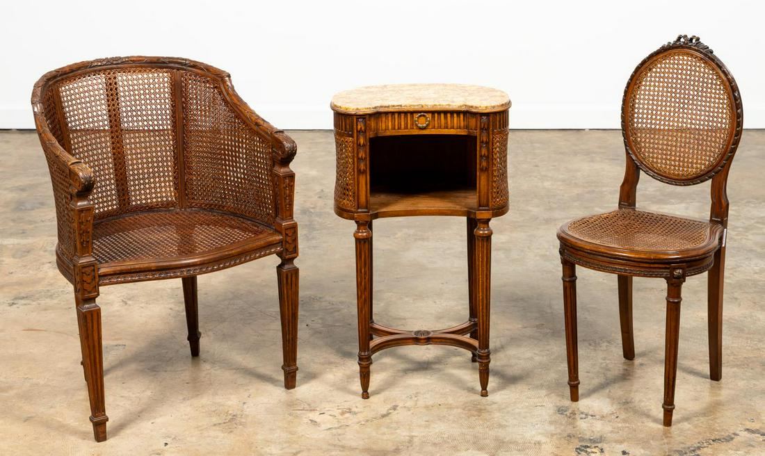 3 PCS, LOUIS XVI STYLE CANED FURNITURE: French, early 20th century. Three pieces of Louis XVI style caned furniture comprising of one bergere, one side chair, and one marble top side table or night stand. Apparently unmarked. Approx. arm ch