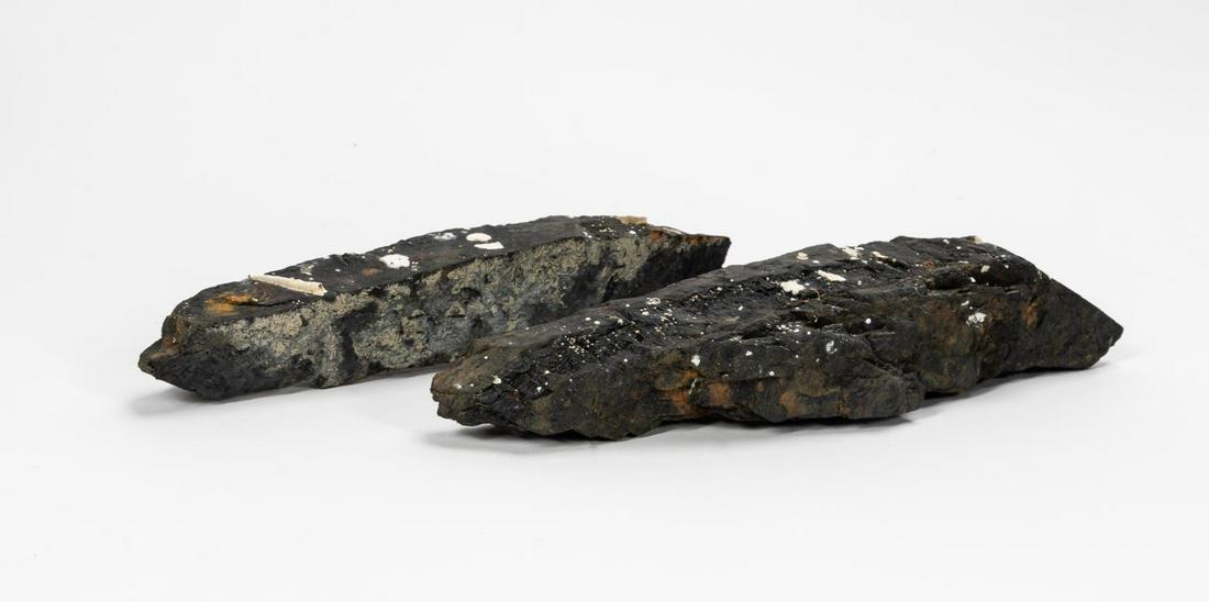RMS CARPATHIA, SALVAGED COAL IN TWO PIECES: RMS Carpathia, Cunard Line, maiden voyage May 5, 1903; sunk July 15, 1918. Salvaged single piece of irregular coal, now in two pieces, with barnacles. On average a Cunard Line ocean liner would use 1,