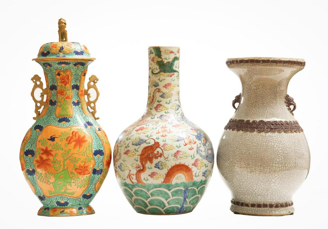 GROUP OF THREE ASIAN VASES: A Chinese celadon crackle baluster vase (approx. h. 15.5"), Chinese lidded urn with gilt lion finial and teal and salmon decoration (approx h. 18.5"), and a bottle form Chinese vase in famille rose pa