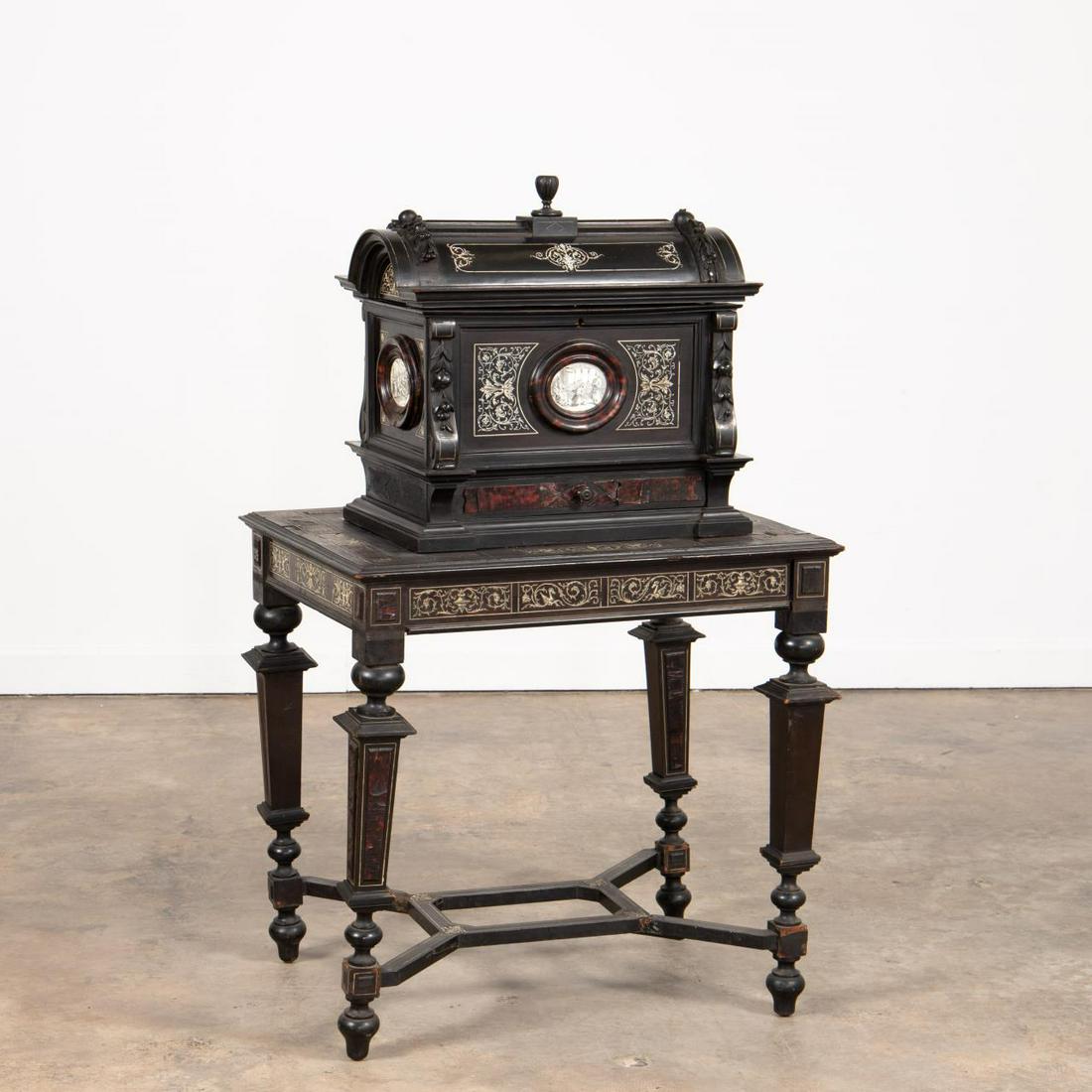 19TH C. EBONIZED & INLAID SMALL CASKET ON STAND: Continental, likely Italian, late 19th century. Penwork bone and shell inlaid ebonized casket or chest on stand, in the North Italian baroque taste, the domed casket decorated with carved fruit, figur