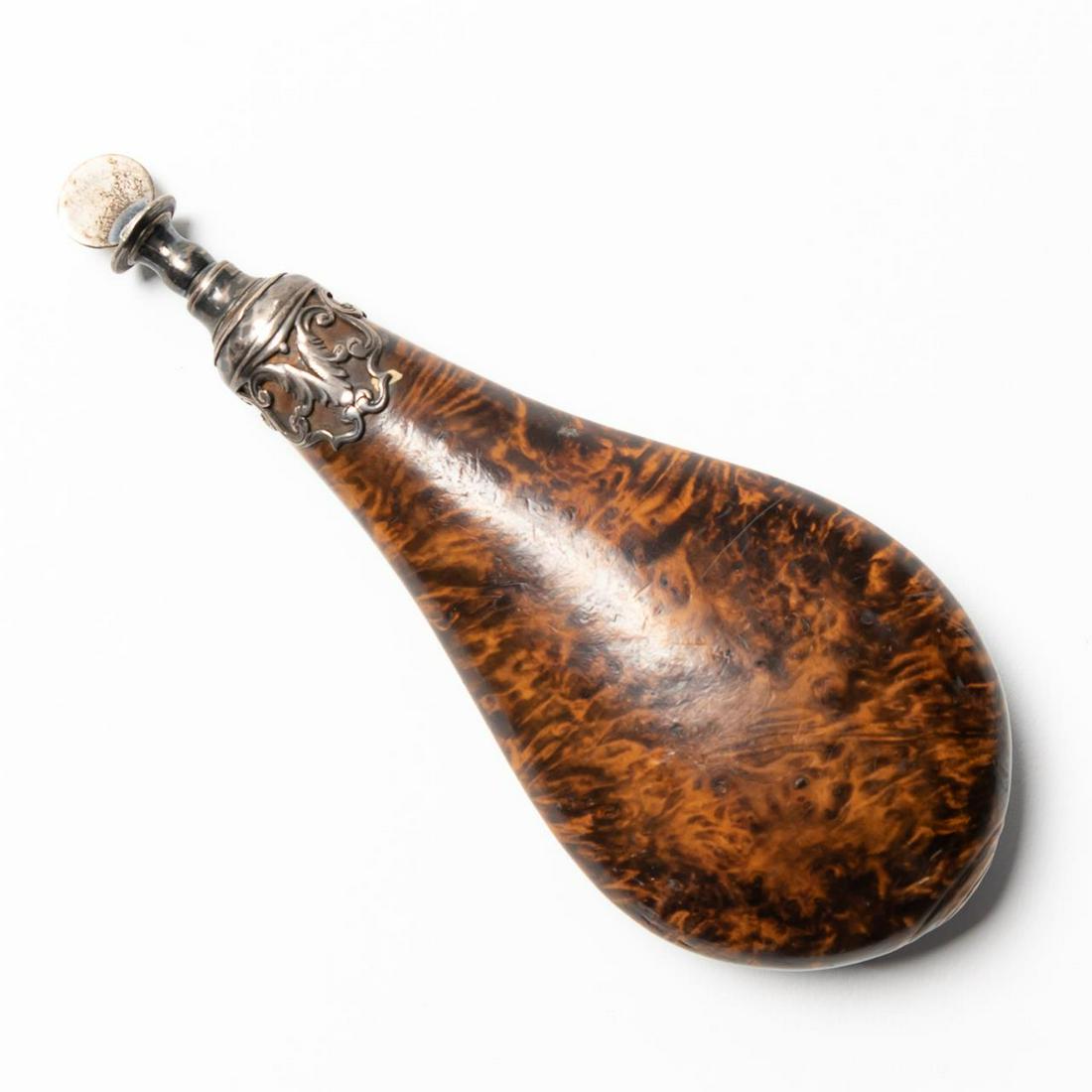 19TH C. FRENCH ROSEWOOD & SILVER POWDER HORN: French, 19th century. Rosewood tear drop form powder flask with silver pierced mount and stopper. Provenance: Acquired from Czerny's International Auction House on September 16, 2017, lot 529, for $12