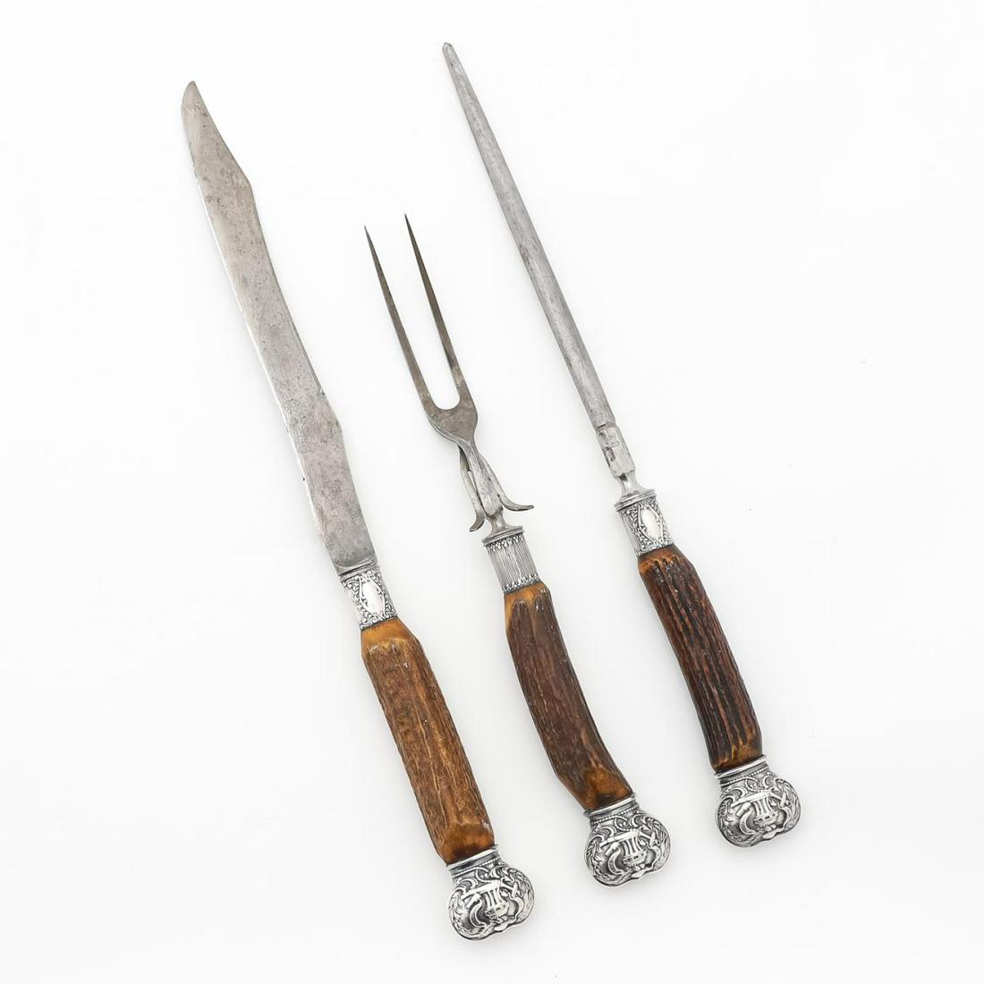 UNITED STATES NAVY ANTLER HANDLE CARVING SET, 3PCS: T. Hessen & Bruch (German, 19th/20th century), late 19th to early 20th century. Unusual sterling silver mounted antler United States Navy officer's dining room carving set, comprising a knife, honing