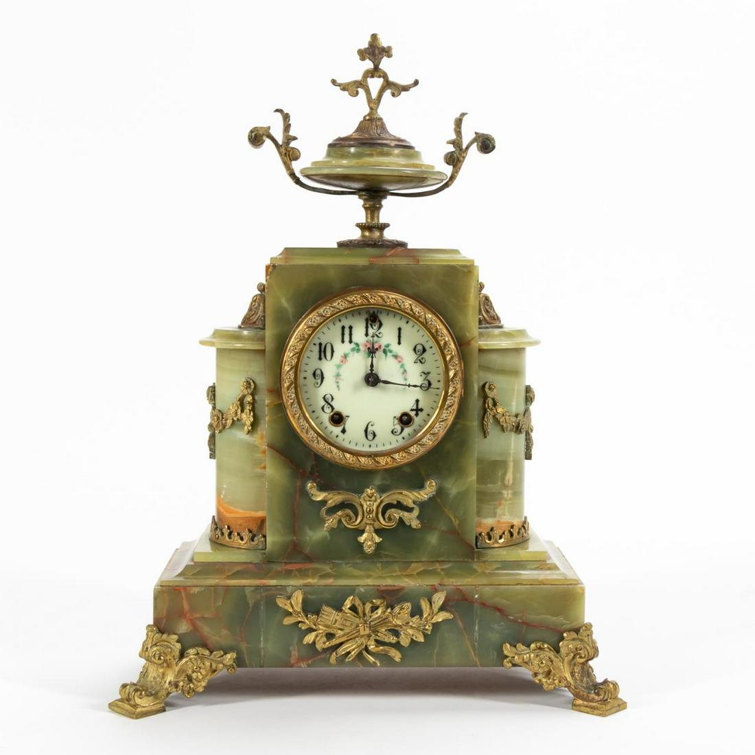 19TH C. AMERICAN GREEN ONYX & BRONZE MANTEL CLOCK: William L. Gilbert Clock Co. (American, est. 1840), circa 1871. Green onyx and ormolu mantel clock having floral swags and porcelain face. Marked to back of works. Approx. h.17.75" (top of finial), w.