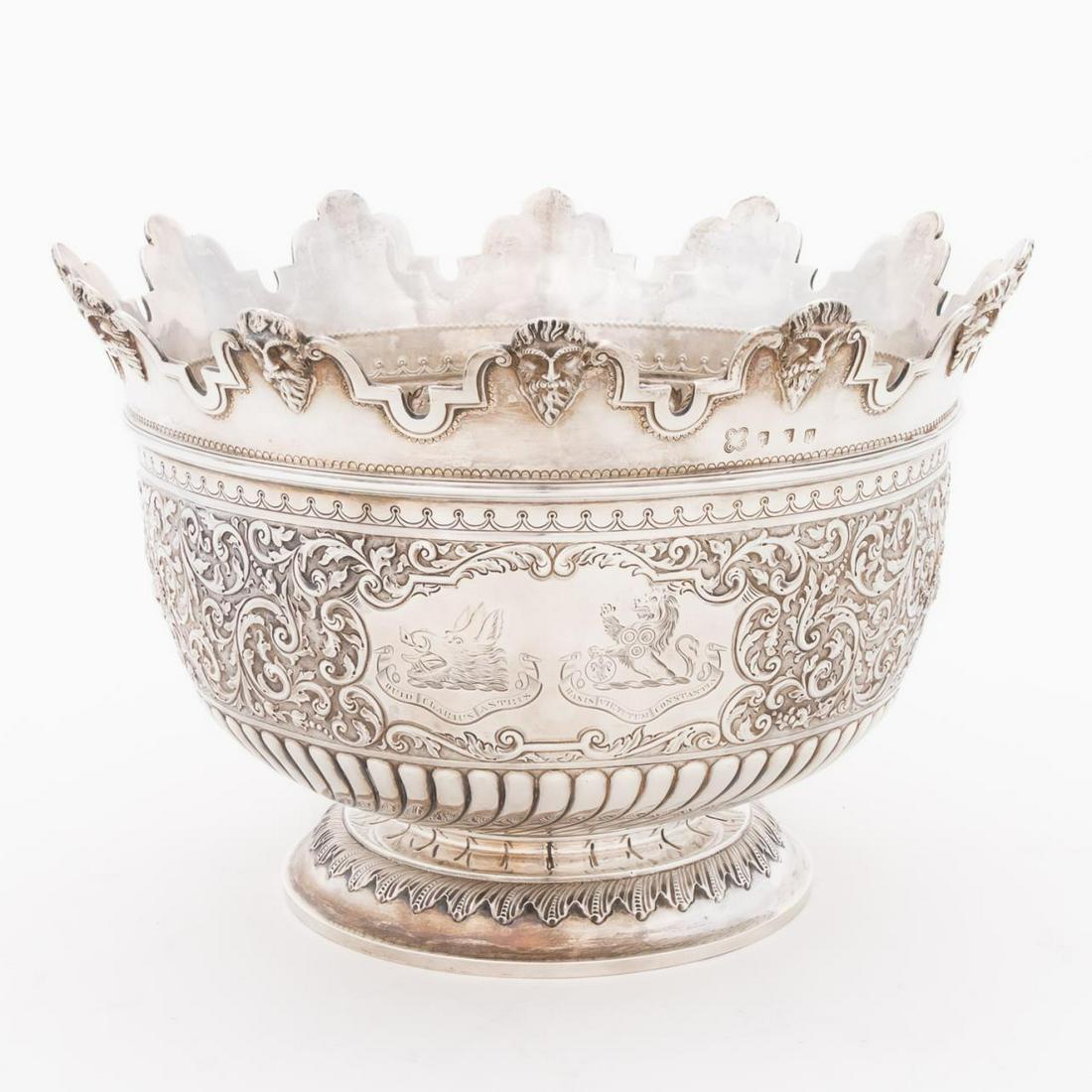 L. 19TH C. SCOTTISH STERLING SILVER MONTEITH: George Edward & Sons (Glasgow & London), 1893. Victorian sterling silver monteith having center band floral scroll motif, mask motif rim and two armorial crest and wreath decoration with etched mottos