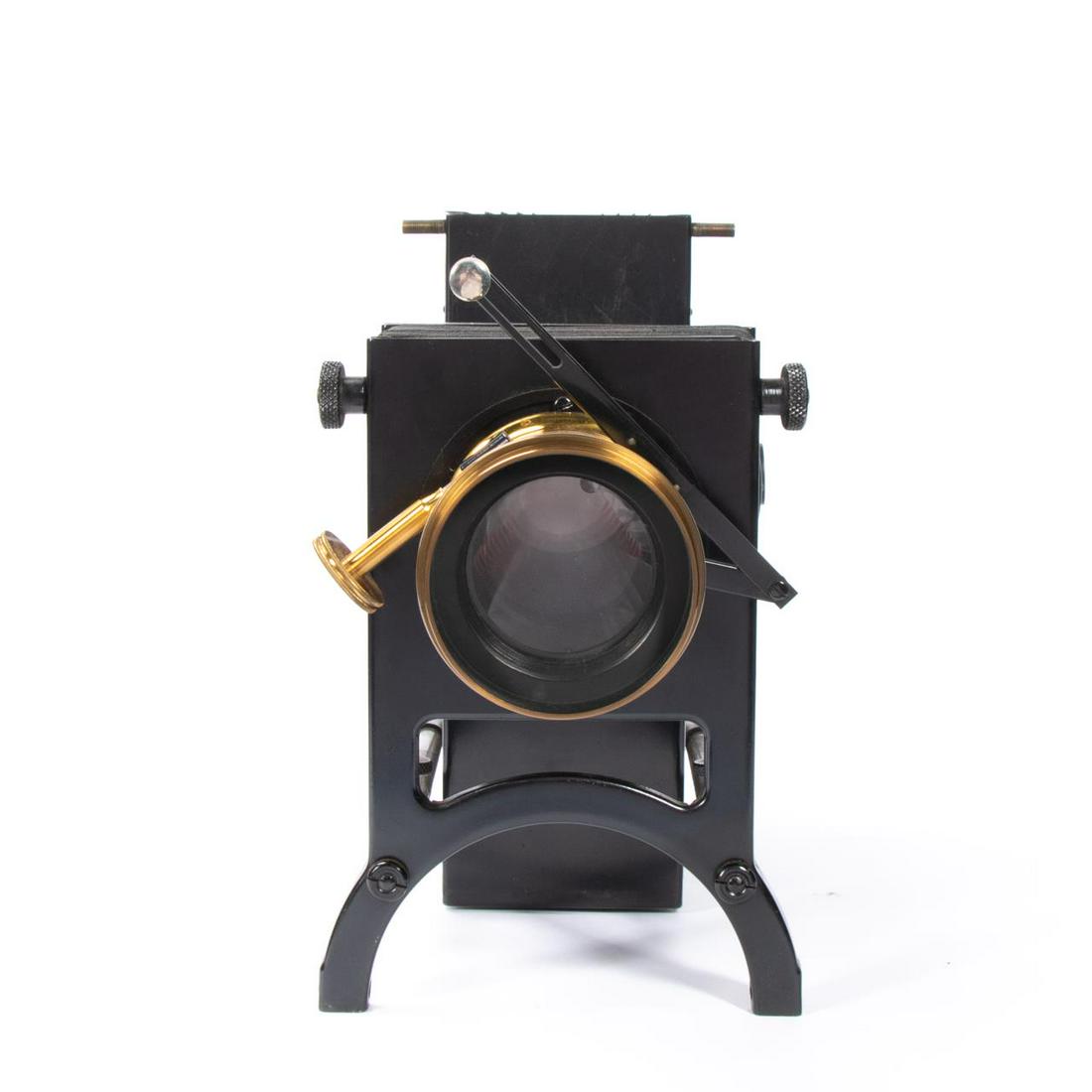 ANTIQUE BAUSCH & LOMB SLIDE PROJECTOR: Bausch and Lomb (American, founded 1853). Magic lantern style slide projector number 5533, in wood case. Appropriately marked. Approx. w. 21" Item from the Estate of Forest "Tag" Hunter, Atlanta, GA.