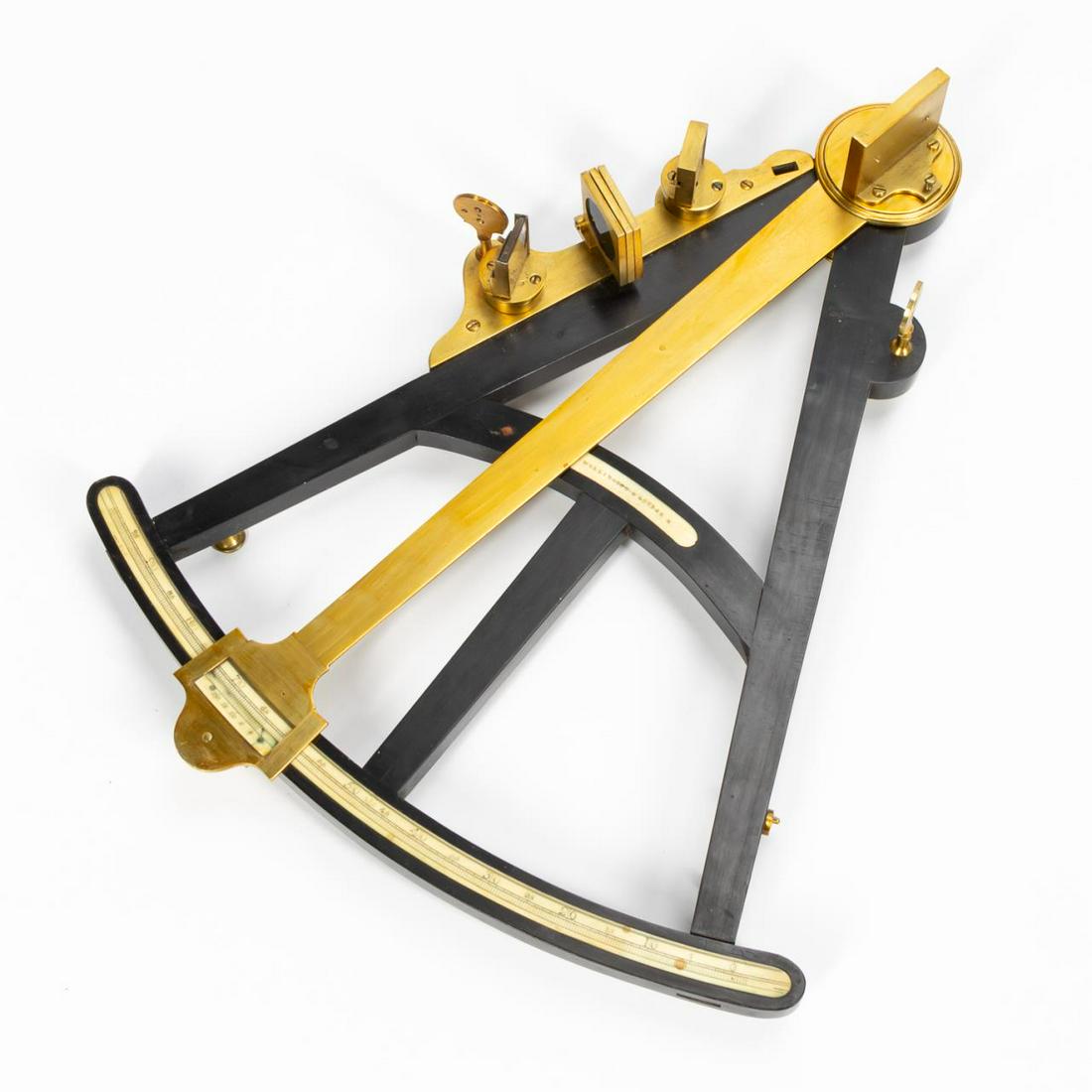 18TH/19TH C. WELLINGTON MARINER'S OCTANT IN CASE: Alexander Wellington (English, active London, 1784-1815). George III era inlaid ebony and brass mariner's octant in original green painted wooden case. Signed to frame. Approx. total length of octant,