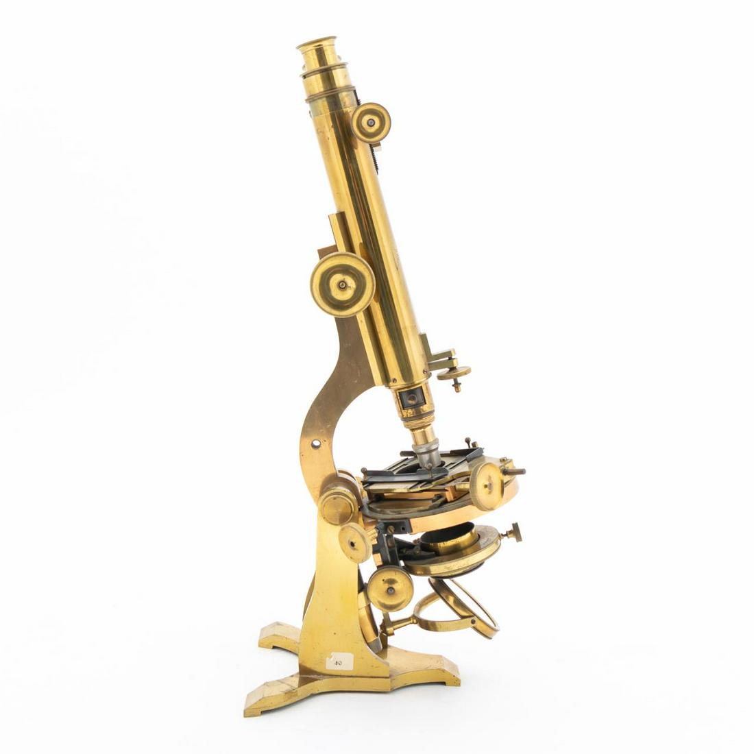 19TH C. HENRY CROUCH BINOCULAR MICROSCOPE IN CASE: Henry Crouch (Active, London, circa 1867-1907), late 19th century. Binocular microscope, 886, having dual brass tubes, circular stage with substage having a silvered scale, gimbaled plano/concave mirr