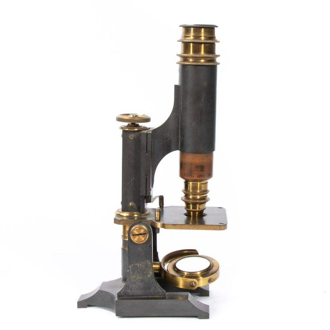 J. PARKES & SON 'ENGLISH MEDICAL' MICROSCOPE: James Parkes & Son (English, 1846-1908?), circa 1880. Iron and lacquered brass 'English Medical' monocular microscope having a square stage, gimbaled plano and concave mirrors, and on a Y-shaped base;