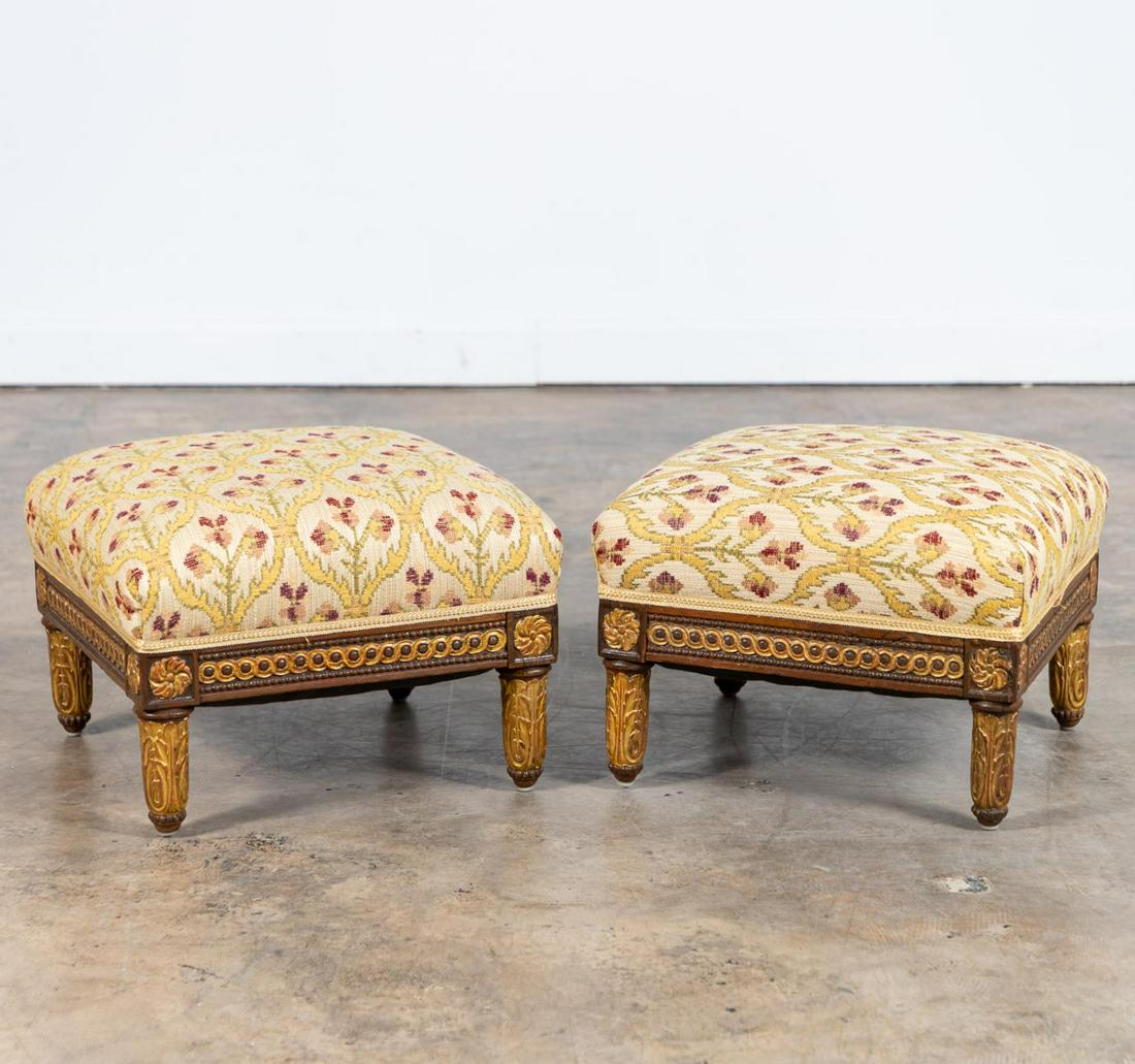 PAIR, LOUIS XVI STYLE PARCEL GILT TABORETS: Continental, 20th century. Par of parcel gilt tabourets or footstools, in the Louis XVI neoclassical taste, having guilloche carved frames, rosette blocks, and rising on acanthus patterned legs. Unmar