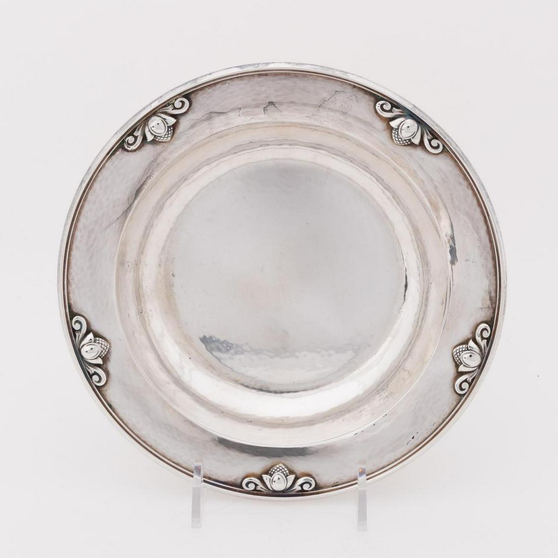 GEORG JENSEN STERLING SILVER: Johan Rohde for Georg Jensen (Danish, founded 1904), 20th century. Sterling silver 'Acorn' (introduced 1915) pattern large bon bon bowl with hammered interior. Marked to the underside with pattern num