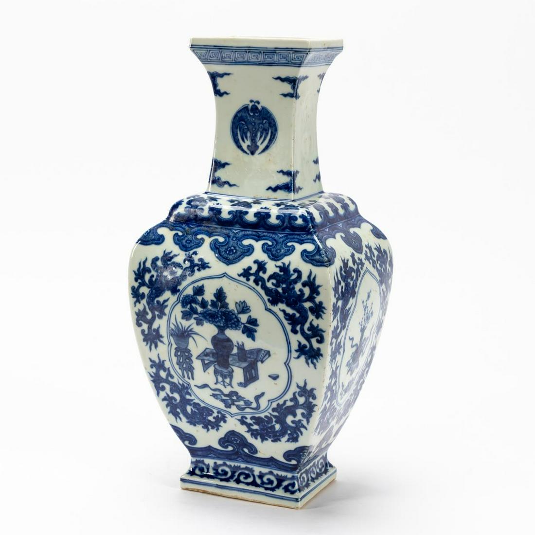 CHINESE BLUE & WHITE FLORAL MOTIF BALUSTER VASE: Chinese. Baluster form blue and white porcelain vase having meander border and a floral and bat motif. Seal mark to underside, Qianlong style. Approx. h. 17".