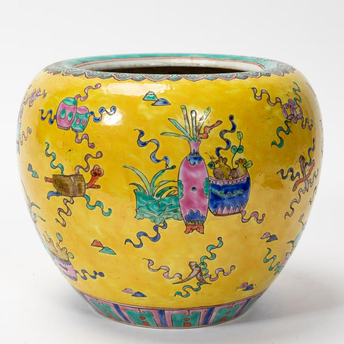 CHINESE REPUBLIC FAMILLE JUANE PORCELAIN JAR: Chinese. Famille juane porcelain jar with Buddhist and precious object symbolism. Red character mark to underside Approx: 5" x 5.5".